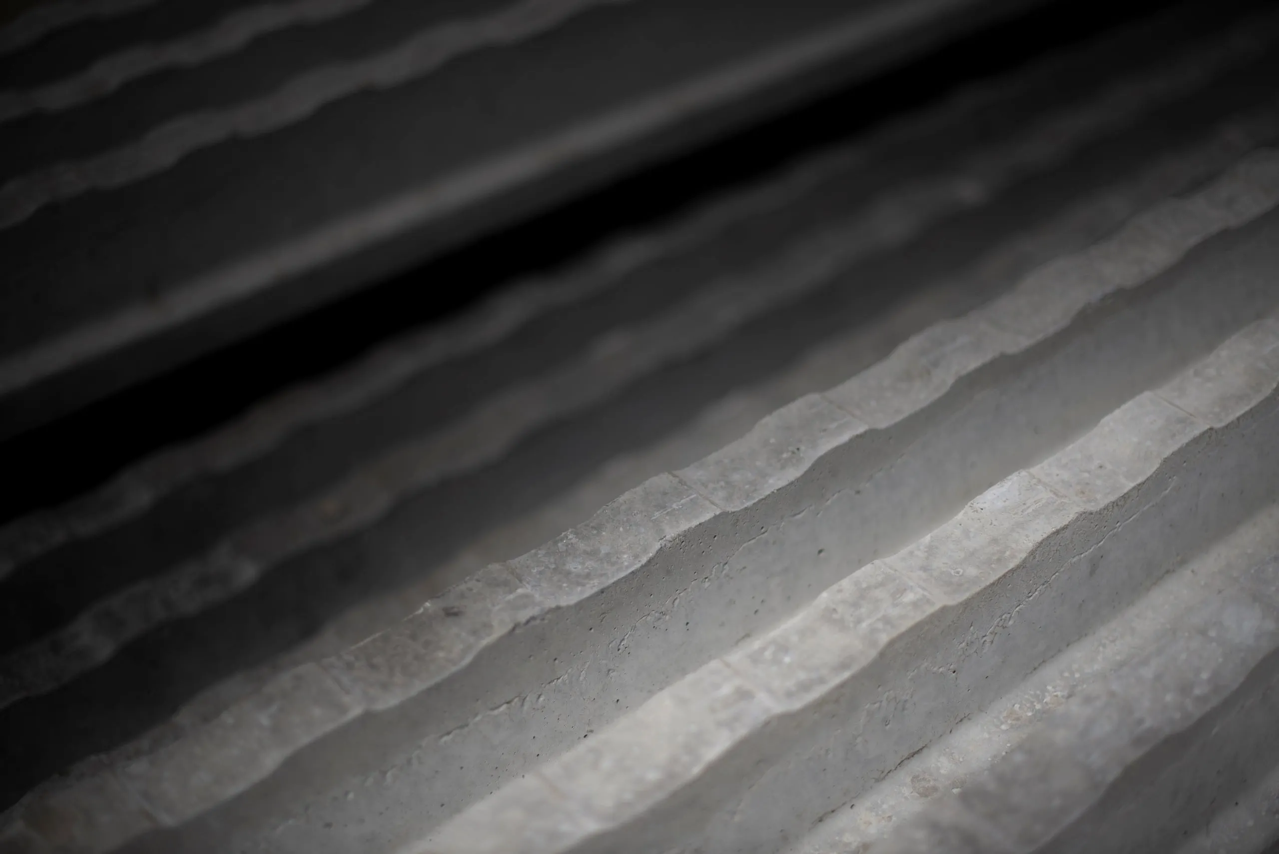 Abstract close-up of wavy, striped lines in black and white